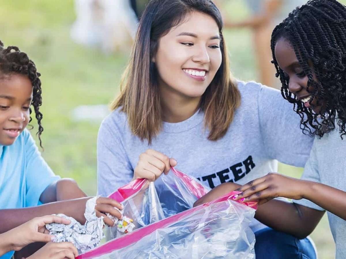 Teen girl leading a volunteer cleanup event